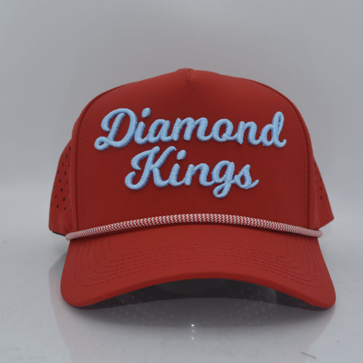 Red cap with 'Diamond Kings' text 3d puff letters on a white background